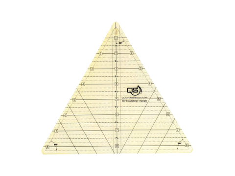 A clear, triangular quilting ruler with black markings for measurements and angles.