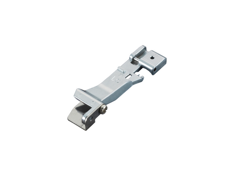 Brother Ruffler Foot 7mm, a silver metal sewing machine attachment.