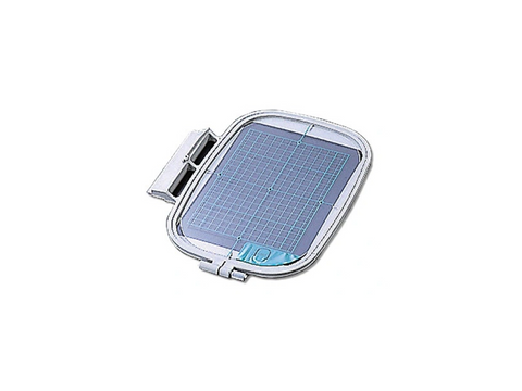 A Brother Medium Plus Hoop, 7x5, with a blue grid overlay.
