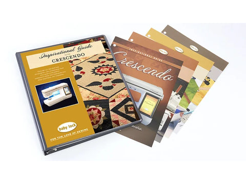 A Baby Lock Crescendo Inspirational Guide binder with accompanying instructional pages.