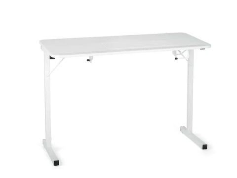 White Gidget I sewing table with a manual lift and sturdy steel legs.