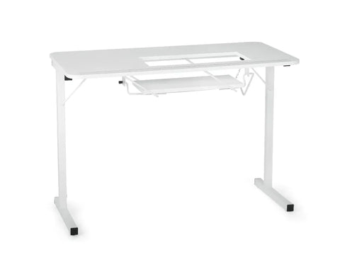 White Arrow Gidget I sewing table with a cutout for a sewing machine.
