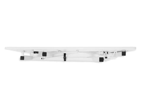 White Gidget I sewing table folded flat, viewed from the side.