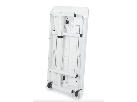 A white Gidget II sewing table is shown folded, revealing its underside with wheels and support structure.