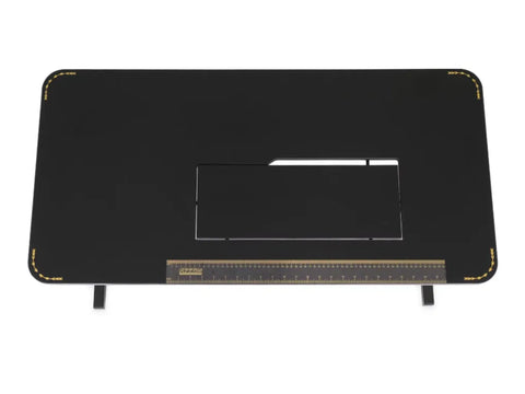 Black sewing table with a ruler and gold corner accents.
