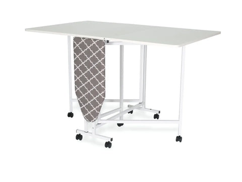 A white cutting and ironing table with a gray patterned ironing board.