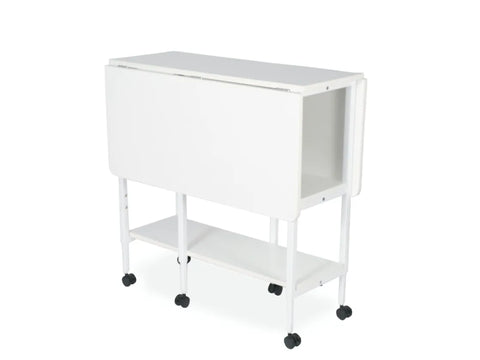 White folding cutting table with two shelves and wheels.