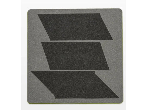 A gray AccuQuilt GO! Blazing Star die with three dark gray parallelogram shapes.