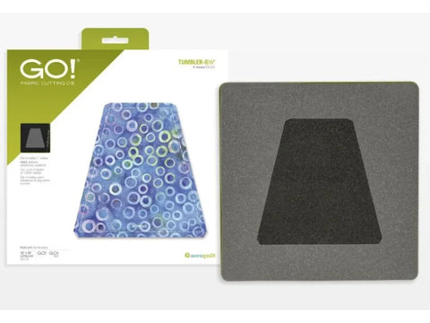 A fabric cutting die for a 6-1/2 inch tumbler shape, shown with its packaging.