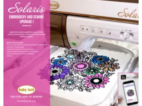 Baby Lock Solaris embroidery and sewing machine with a colorful floral design on fabric.