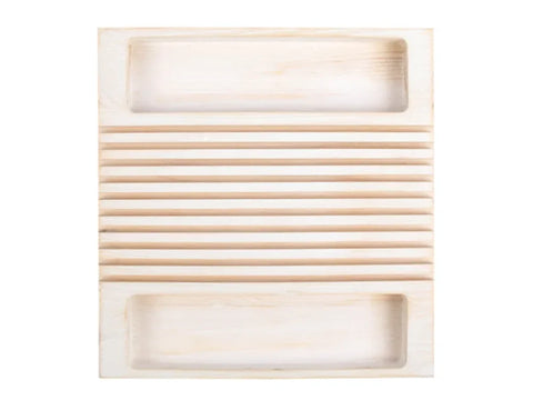 White wooden ruler holder with horizontal slots and two recessed trays.