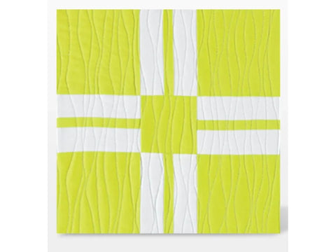 A lime green and white fabric cutting die with wavy and straight lines.