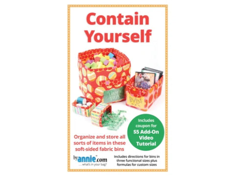 Soft-sided fabric bins in various sizes and patterns, holding craft supplies and DVDs.