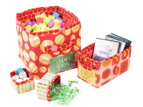 A collection of fabric storage bins in various sizes and patterns.
