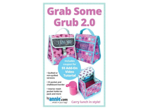 Two pink and purple lunch bags are displayed, one open with a pink thermos.