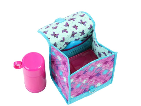 A pink and blue patterned lunch bag with a matching pink thermos.