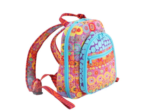 A colorful floral backpack with blue zippers and straps.