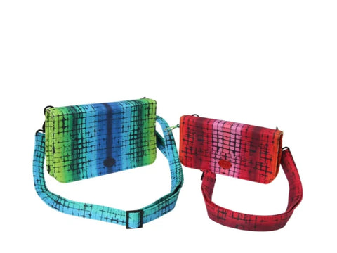 Two rectangular crossbody wallets with adjustable straps, one in blue-green and one in red-pink.