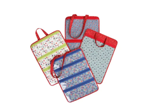 Four floral-patterned fabric organizers with red trim and handles are displayed.