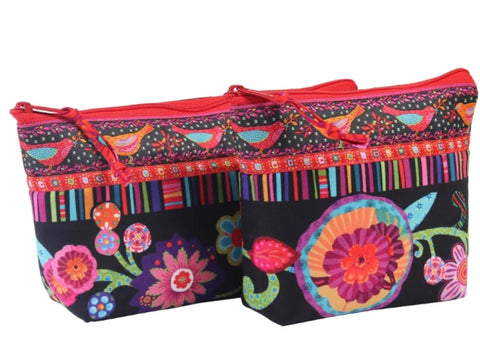 Two colorful fabric bags with bird and floral patterns.