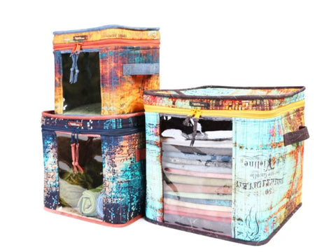Three colorful storage bins with clear front panels and zippers.