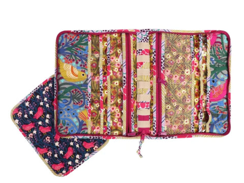 Open fabric tool case with colorful bird and floral patterns.