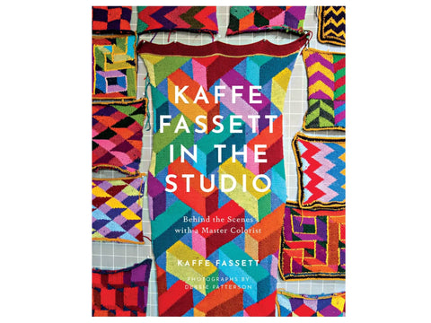 Book cover for "Kaffe Fassett In The Studio" featuring a colorful knitted geometric design.