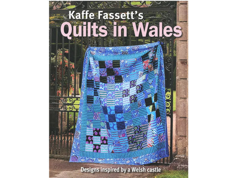Kaffe Fassett's Quilts in Wales book cover features a blue quilt on a gate.