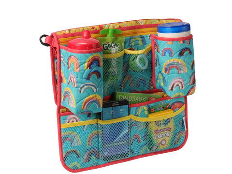 A quilted turquoise organizer with a rainbow pattern, filled with snacks, a phone, and crayons.
