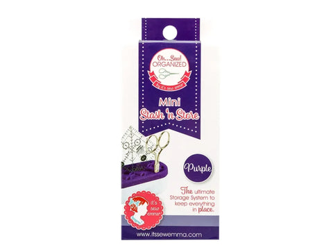 A purple Mini Stash 'n Store organizer with scissors and a ruler inside.