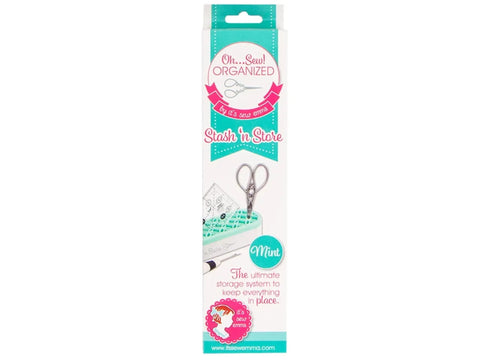 A mint green Stash 'n Store organizer with sewing tools in its packaging.