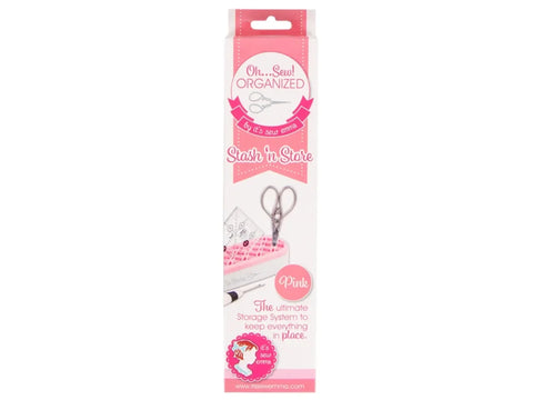 A pink Stash 'n Store organizer with sewing notions and scissors.