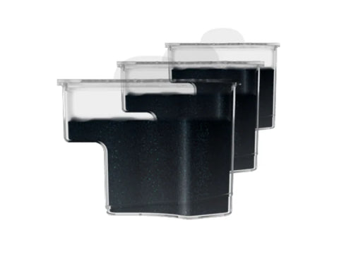 Three transparent anti-scale cartridges filled with black granules are arranged diagonally.