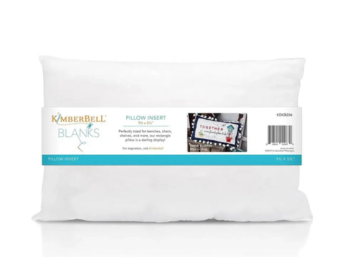 A white rectangular pillow insert with a blue and white label.