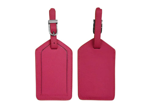 Two Indian pink leather luggage tags are displayed, one showing the front with a buckle, and the other the back.