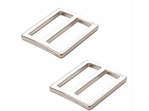 Two nickel-colored metal rectangular sliders with two bars.