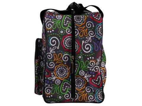 A black machine tote with a colorful, intricate floral and paisley pattern.
