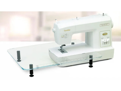 A white Baby Lock Sashiko sewing machine with an attached clear extension table.