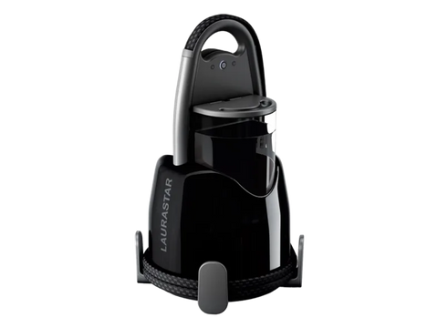 A black Laurastar Lift Plus portable steam iron with a handle and hose.