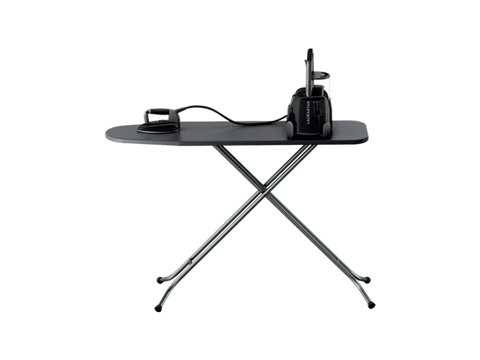 A black Laurastar Lift Plus steam iron and ironing board.