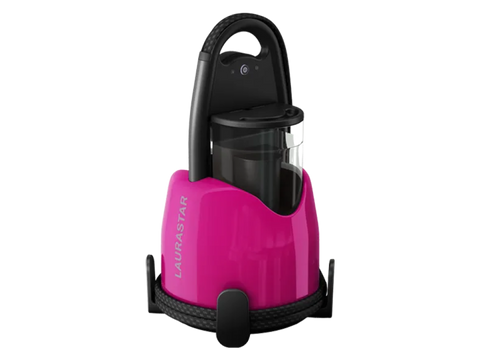 A pink and black Laurastar Lift Plus portable steam iron with a textured handle.