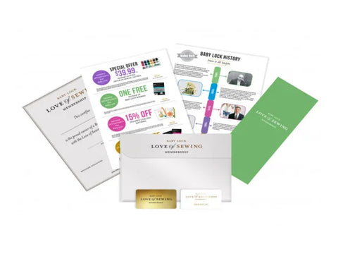 A collection of Baby Lock Love of Sewing membership materials, including cards, an envelope, and informational pamphlets.