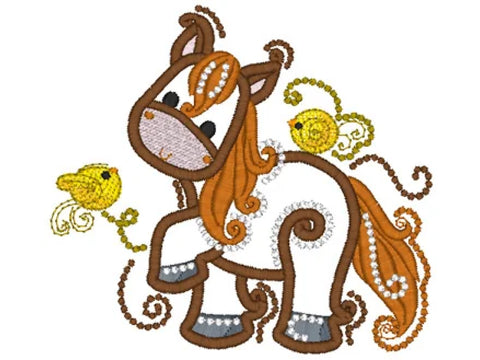 An embroidered brown and white horse with an orange mane and tail, adorned with white beads, accompanied by two yellow birds.