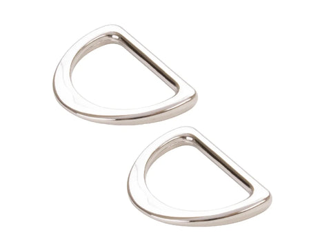 Two shiny nickel D-rings are shown against a white background.