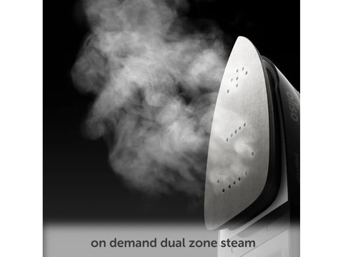 Oliso M3Pro Project Iron with steam emanating from the soleplate.