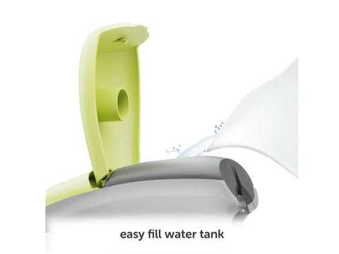Pistachio green Oliso M3Pro Project Iron with an open, easy-fill water tank.
