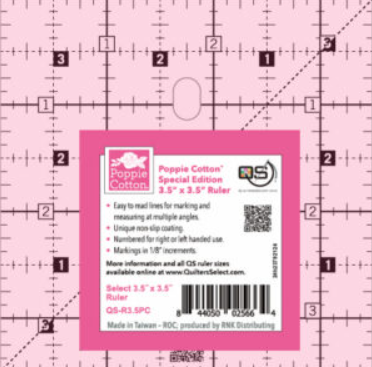 A pink 3.5 by 3.5 inch quilting ruler with a white grid and a pink label.