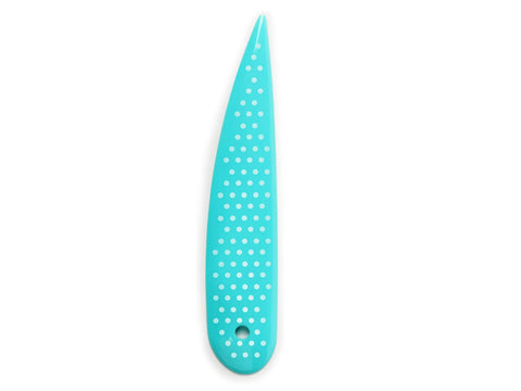 Turquoise point turner with white polka dots and a hole at the bottom.