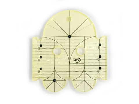 A yellow Quilters Select Diameter Arc Ruler with black markings and a logo.