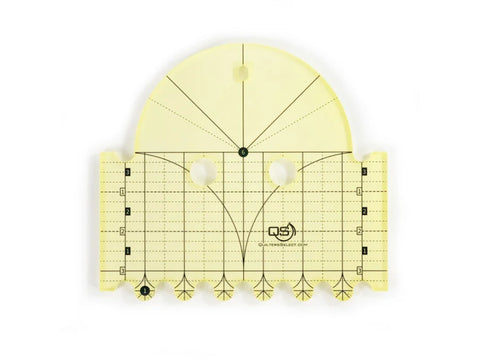 A yellow transparent Quilters Select Diameter Arc Ruler with black markings.